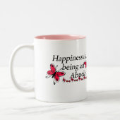 幸福はAbuelaの蝶です ツートーンマグカップ (左)