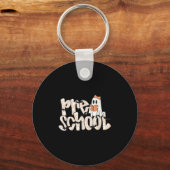 幼稚園の先生のハロウィンゴースト教師の読書 キーホルダー (正面)