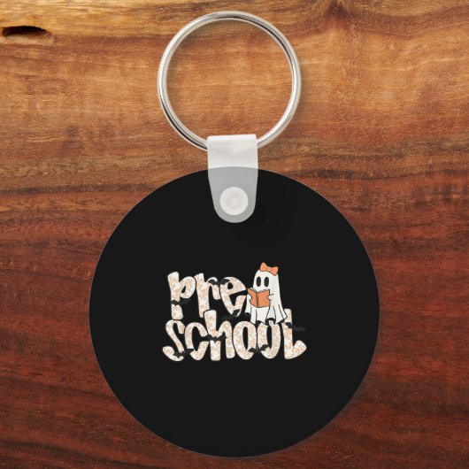 幼稚園の先生のハロウィンゴースト教師の読書 キーホルダー (正面)