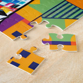 幾何学模様のカラフルの上にライオン ジグソーパズル (側面)