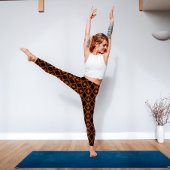 幾何学模様の火オレンジと黒 レギンス