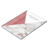 幾何学的できらめくなピンクおよび金ゴールドの大理石のノート ノートブック (左側)