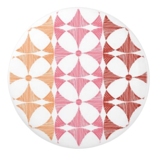 幾何学的で赤いイカットのストライプなパターン セラミックノブ (正面)