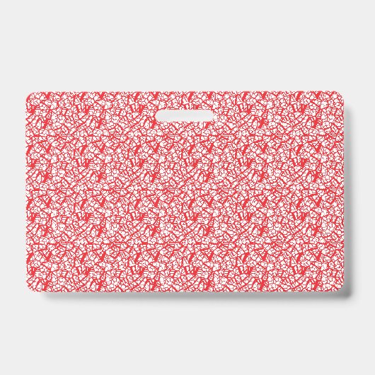 幾何学的なモットを持つ赤とオレンジのラッピング紙 バッジ (正面)