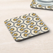 幾何学的な花パターン コースター (左側)