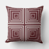幾何学的な赤い入れ子状の四角い角ばった箱のパターン クッション (正面)