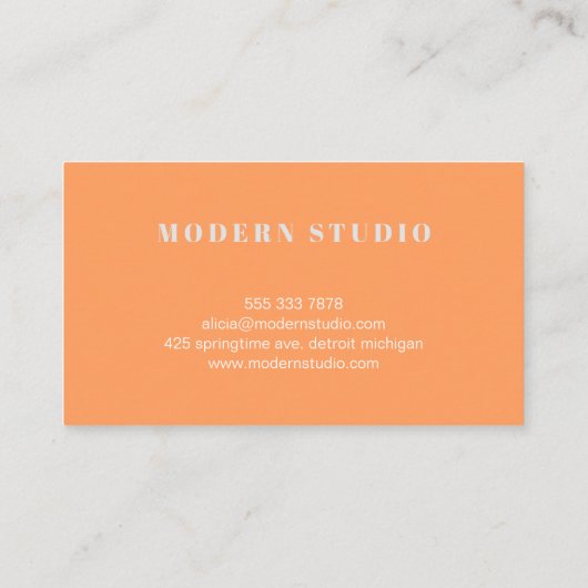 幾何学的モダンオレンジ色モノクロホームデザイナー 名刺 (裏面)