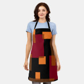 幾何学的抽象化赤オレンジブラウン黒 エプロン (着用した状態)