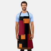 幾何学的抽象化赤オレンジブラウン黒 エプロン (着用した状態)
