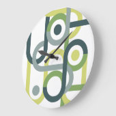 幾何抽象芸術の中世のベージュの緑の投げピ ラージ壁時計 (傾斜)