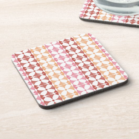 幾何赤のイカットストライプパターン コースター (左側)