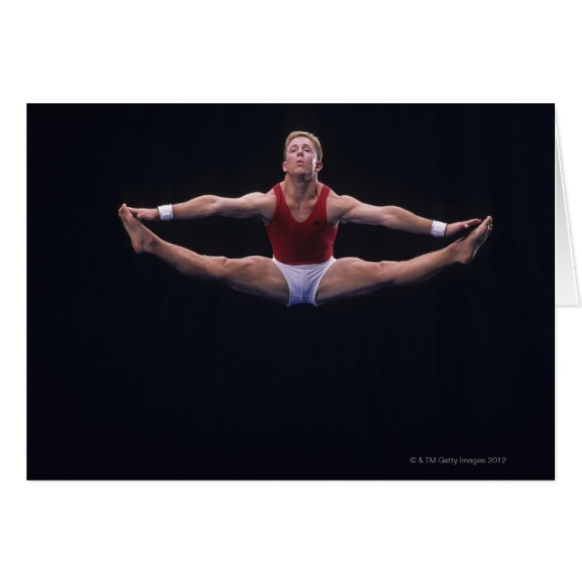 床の上で行う男性の体操選手エクササイズ (正面横)