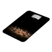 床の上に置かれている多くのバスケットボール マグネット (左側)