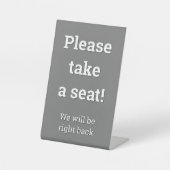 「座ってくれ！」 台座サイン (正面)