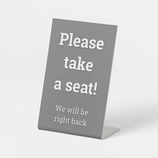 「座ってくれ！」 台座サイン (正面)