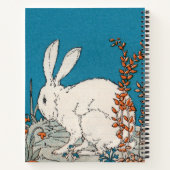 座ってフワフワ白うさぎオレンジ白い花 ノートブック (裏面)
