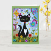 庭に座るタキシードキャット カード (黄色い花)