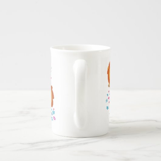 庭の可愛い漫画のライオンの骨の中国マグカップ ボーンチャイナマグカップ (裏面)