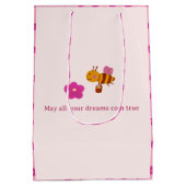 庭の誕生日に水色のピンクのウサギ ミディアムペーパーバッグ (裏面)