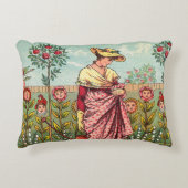 庭園で花を育てる女性のアート・アンティーク アクセントクッション (正面)