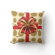 弓が付いているモダンなクリスマス枕、クリーム及び金ゴールドの水玉模様