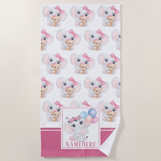 弓とガーリー風船の模様を持つピンクの象 ビーチタオル (正面)