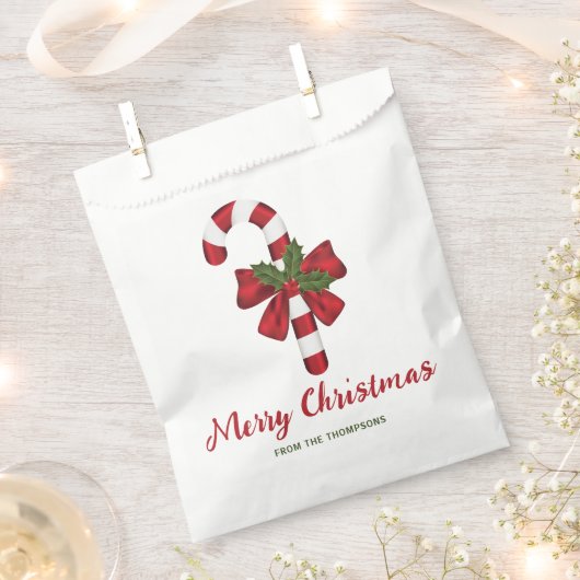 弓とクリスマスホリー付きキャンディーケーン&文字 フェイバーバッグ (クリップ留めされた状態)