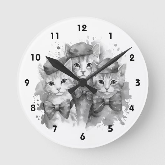 弓と帽子の白黒の子猫 ラウンド壁時計 (正面)