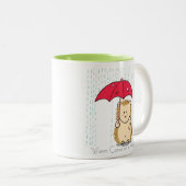 引き裂かれた傘のマグを持つかわいいハリネズミ ツートーンマグカップ (正面右)