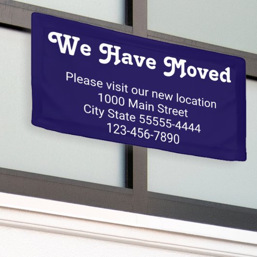 引っ越し場所は青 横断幕 (ビルの外側)