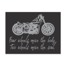 引用文4輪用バイクもしくは自転車に乗る人