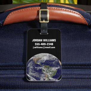 強力な冬の嵐を示す完全な地球。 ラゲッジタグ