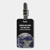 強力な冬の嵐を示す完全な地球。 ラゲッジタグ (正面縦)