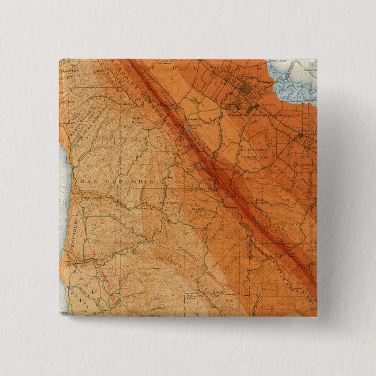 強度と断層を示すサンタクルスの四角形 缶バッジ (正面)