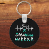 強皮症認識度戦士ハートビートファイトティール(緑がかった色) キーホルダー (正面)