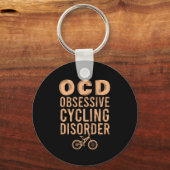 強迫性サイクリング障害 キーホルダー (正面)