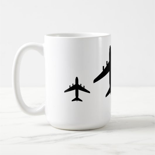 「強風で飛行機を離陸する」 コーヒーマグカップ (左)