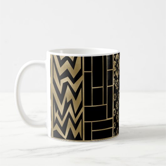 形と花が黒と金ゴールドに絡む コーヒーマグカップ (左)