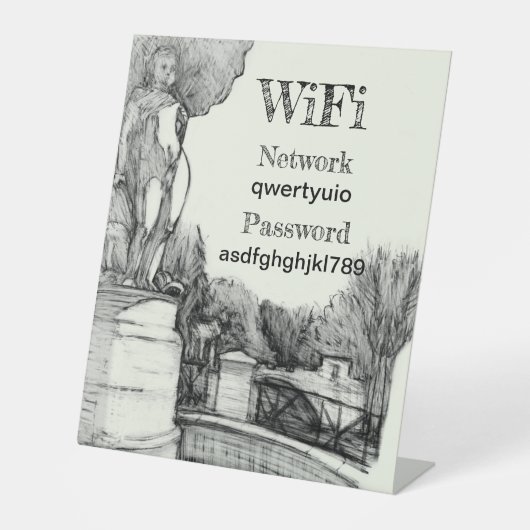 彫刻の少年と公園の古い噴水 台座サイン (正面)