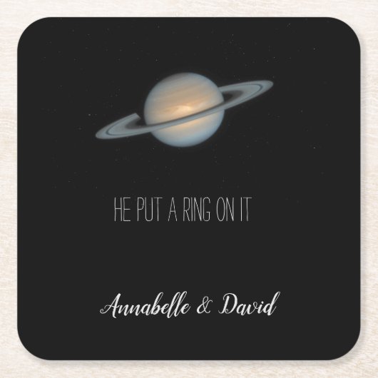 彼が土星をテーマにしたリングや輪を結婚載せる スクエアペーパーコースター (正面)