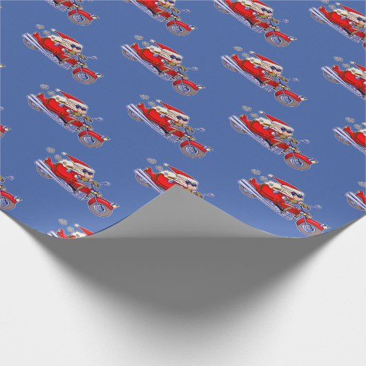 彼のオートバイに乗っている堅い見るサンタクロース ラッピングペーパー (角)