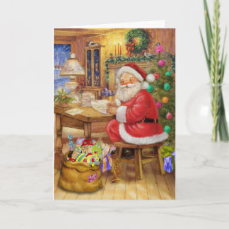 彼の机に取り組んでいるサンタクロース シーズンカード