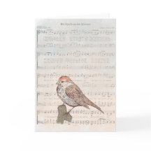 彼の目はスズメのカードに宿っている