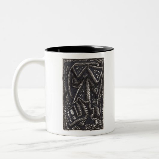 彼は何を…ハート? ツートーンマグカップ (左)