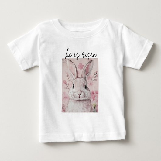 「彼は生まれ変わった」花付きピンクのバニー ベビーTシャツ (正面)