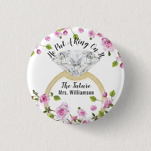 彼は、その上にリングや輪を載せたダモダンイヤフローラ 缶バッジ (正面)