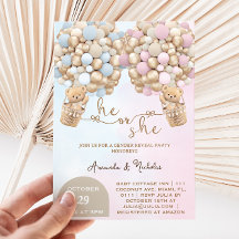 彼または彼女は風船のジェンダーの明かりを付けたテディベア