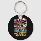 彼らは移民が問題だと言うが、我々はみな見た キーホルダー (正面)