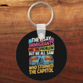 彼らは移民が問題だと言うが、我々はみな見た キーホルダー (正面)