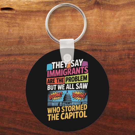 彼らは移民が問題だと言うが、我々はみな見た キーホルダー (正面)